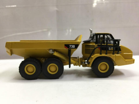 DIECAST MASTERS HO SCALE CAT 730 ARTICULATED TRUCK (85130) (49130) (C1081-25)