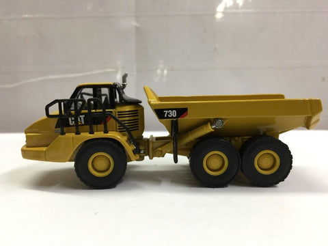 DIECAST MASTERS HO SCALE CAT 730 ARTICULATED TRUCK (85130) (49130) (C1081-25)